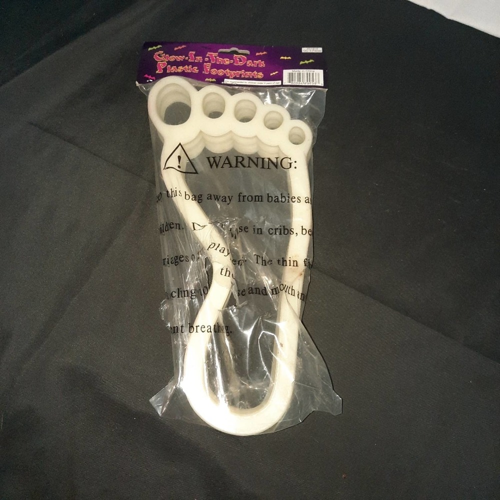 4 sets of 14 glow in dark footprints.